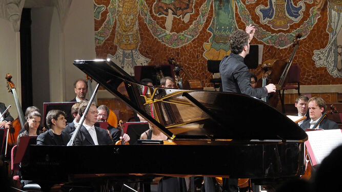 Javier Perianes, Pablo Heras-Casado y la Filarmónica de Múnich en el Palau de la Música de Barcelona durante su reciente gira española.
