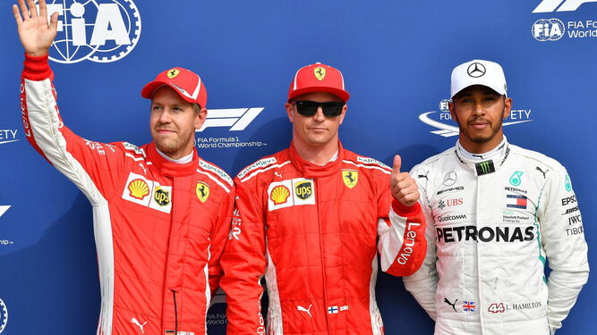 Sebastian Vettel, Kimi Raikkonen y Lewis Hamilton, tras la sesión de clasificación para el Gran Premio de Italia.