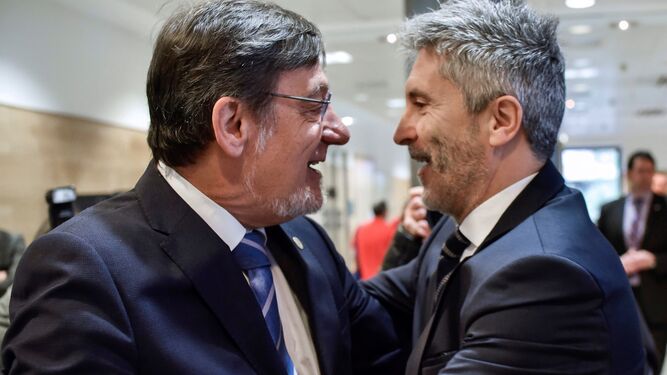 El ministro del Interior, Fernando Grande-Marlaska, y el presidente del TSJPV, Juan Luis Ibarra, este jueves en Bilbao.