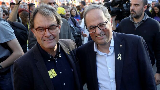 Artur Mas y Quim Torra posan sonrientes en la manifestación secesionista en Madrid el pasado sábado.