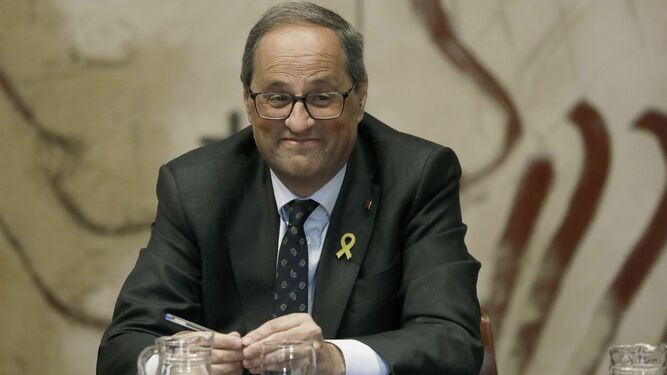 El presidente de la Generalitat, Quim  Torra, con un lazo amarillo en la solapa.