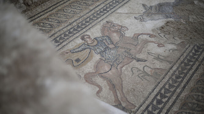Imagen de una cacería a un jabalí encontrada en la Villa Romana de Salar, similar a la imagen que se espera encontrar