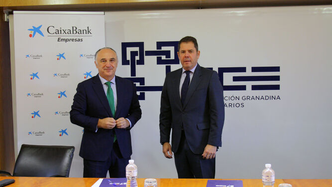 Juan Ignacio Zafra, de CaixaBank, y el presidente de la CGE, Gerardo Cuerva.